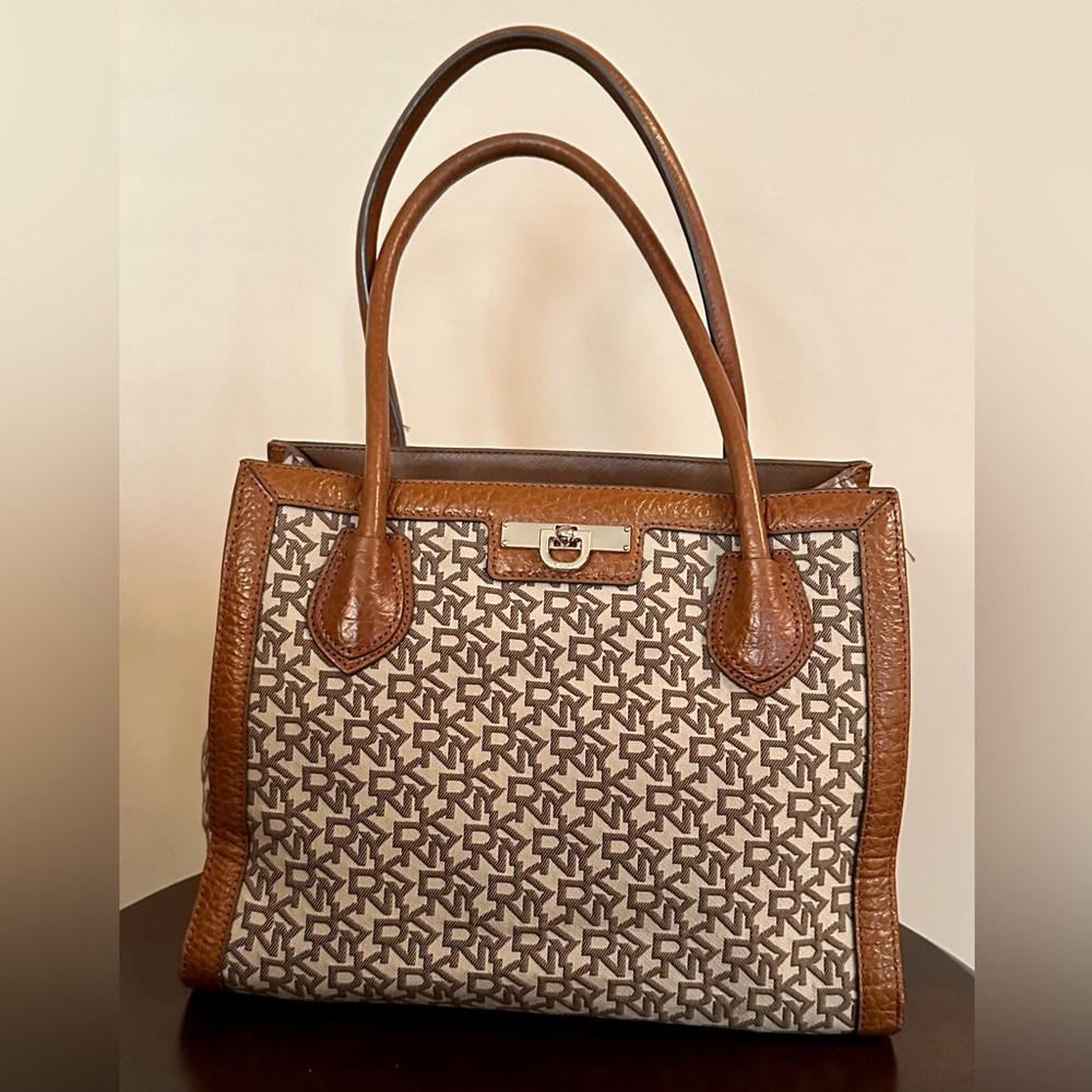 DKNY handbag, rich caramel pebble grain leather and coordinating logo fabric.